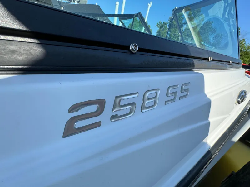 Slide: The Image of 2018 Monterey 258 Super Sport boat side view with model number. - 28
