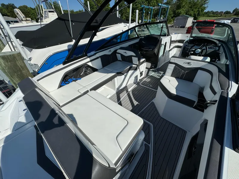 Slide: The Image of 2018 Monterey 258 Super Sport boat interior with white and black seating. - 6