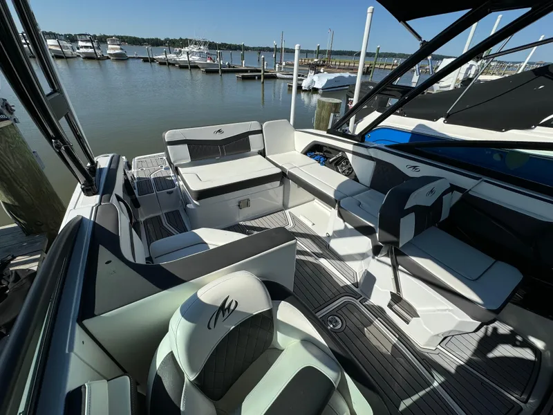 Slide: The Image of 2018 Monterey 258 Super Sport boat interior at a marina. - 7
