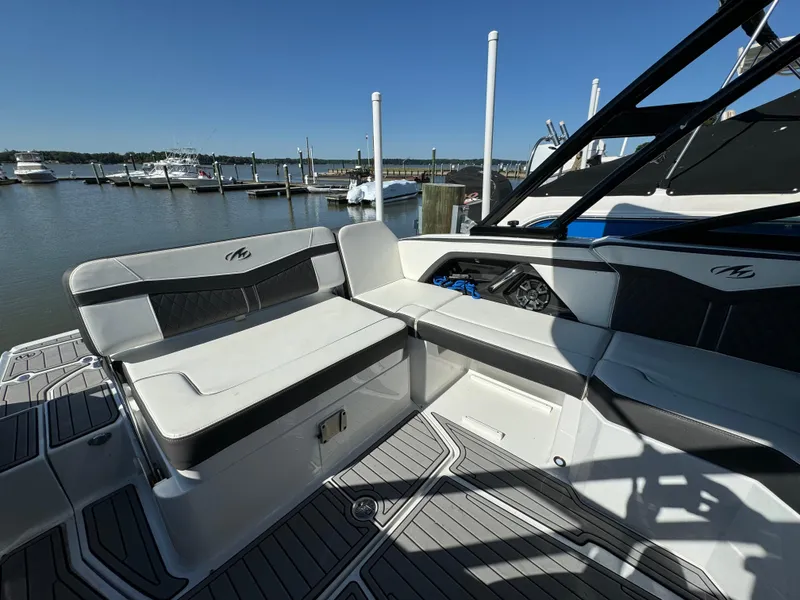 Slide: The Image of 2018 Monterey 258 Super Sport boat interior at a marina. - 9