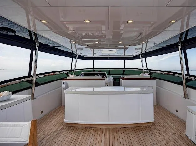 Slide: The Image of Luxurious interior of 2015 Hatteras 100 Raised Pilothouse yacht with modern design. - 37