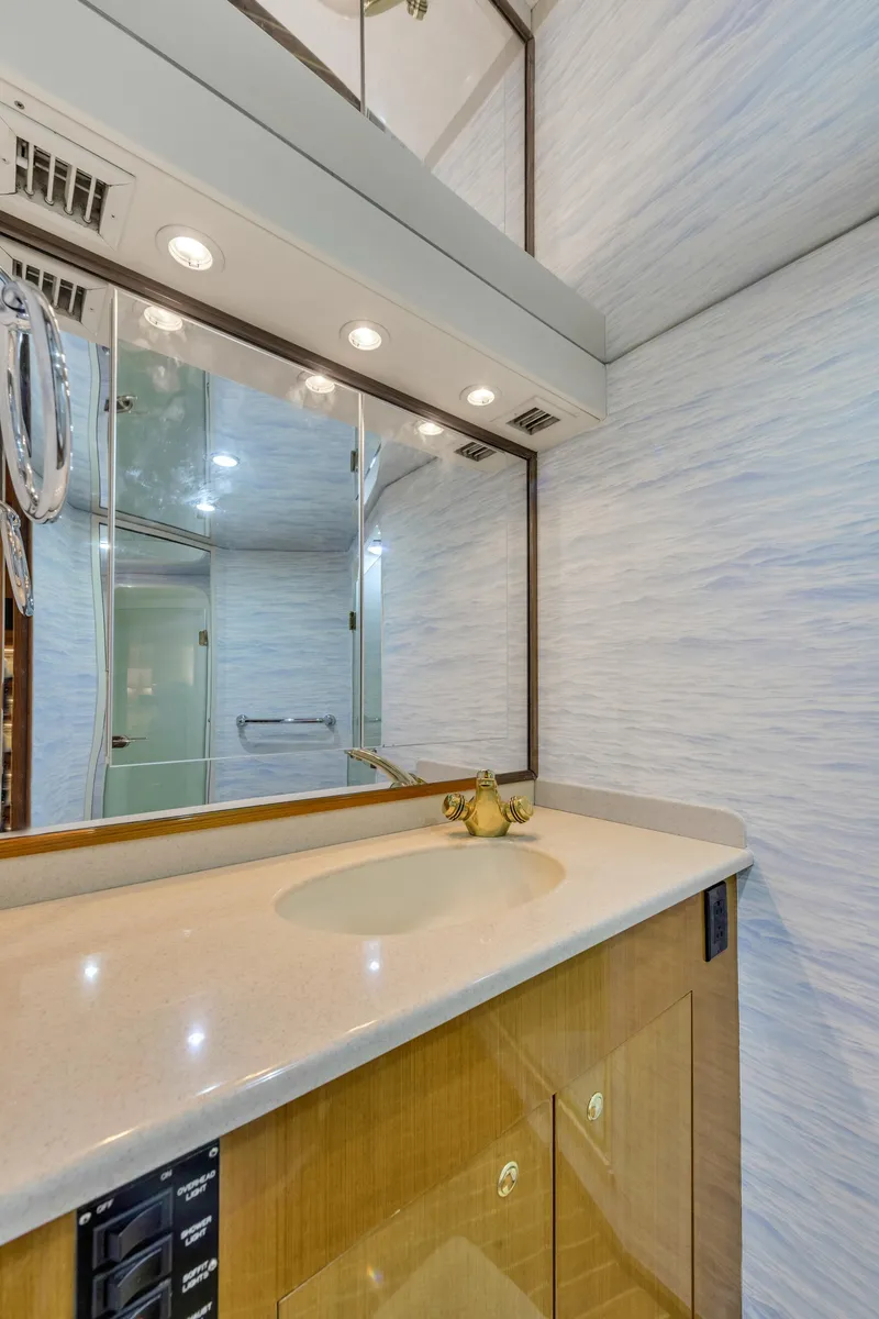 Slide: The Image of 2001 Viking 55 Convertible yacht bathroom with vanity and mirror - 25