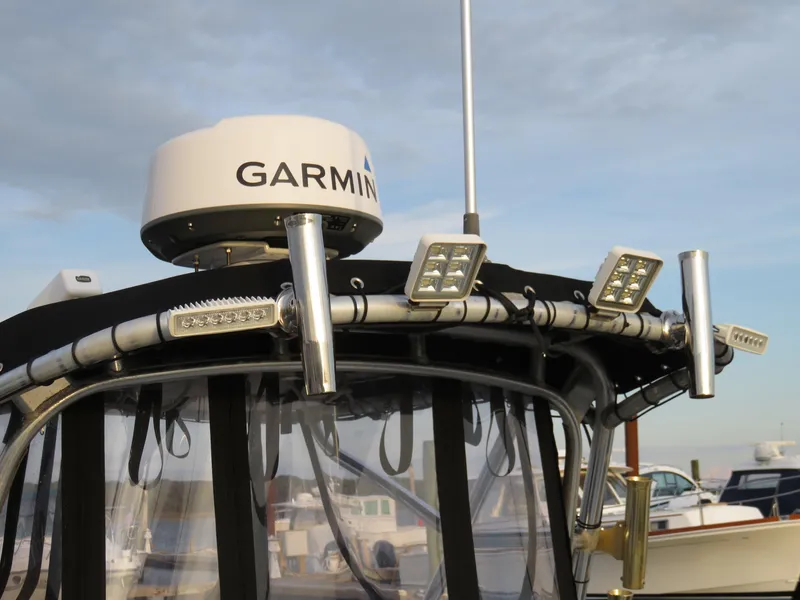 Slide: The Image of 1999 Stamas 250 Express boat with Garmin radar and mounted lights. - 5