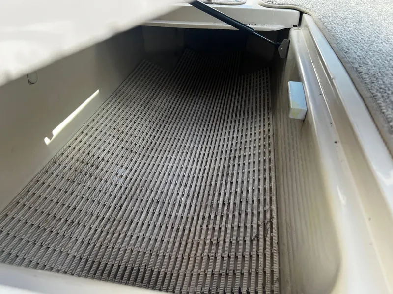 Slide: The Image of Storage compartment of a 2005 Sea Ray 200 Sport boat. - 14