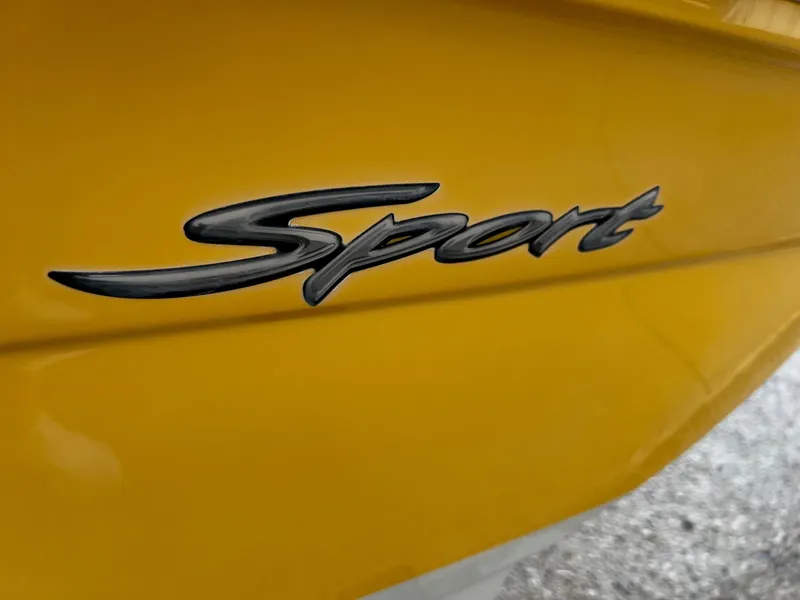 Slide: The Image of 2005 Sea Ray 200 Sport boat emblem on yellow hull - 20