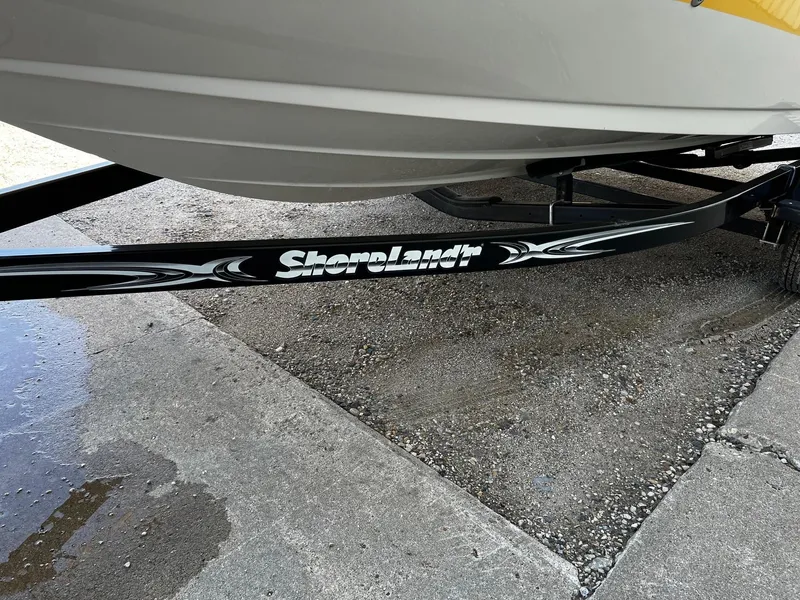 Slide: The Image of 2005 Sea Ray 200 Sport boat on ShoreLand'r trailer. - 21