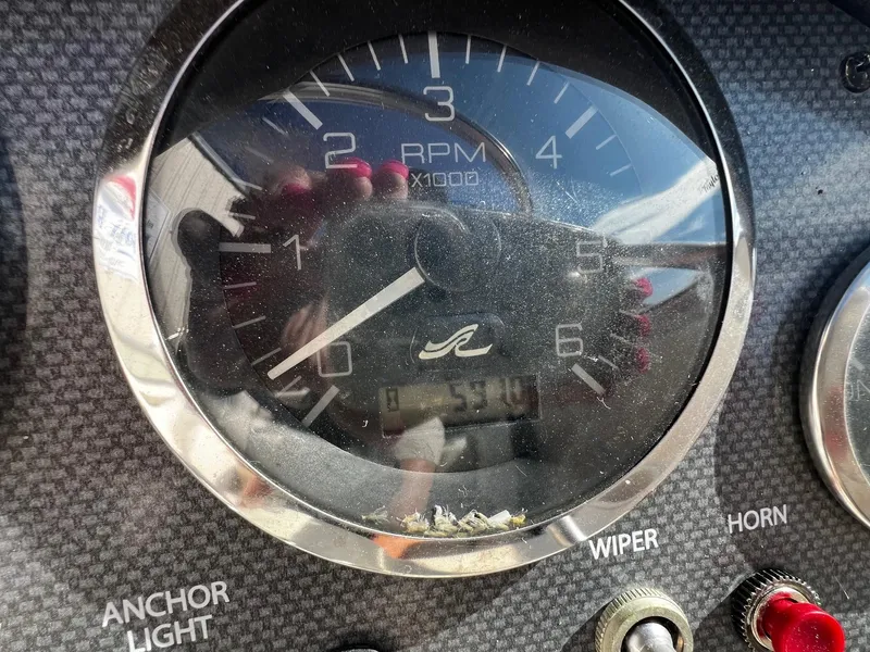 Slide: The Image of Close-up of 2005 Sea Ray 200 Sport tachometer showing RPM gauge. - 9