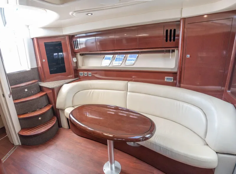 Slide: The Image of Luxurious interior of 2008 Sea Ray 44 Sundancer yacht with elegant seating and wood finishes. - 13