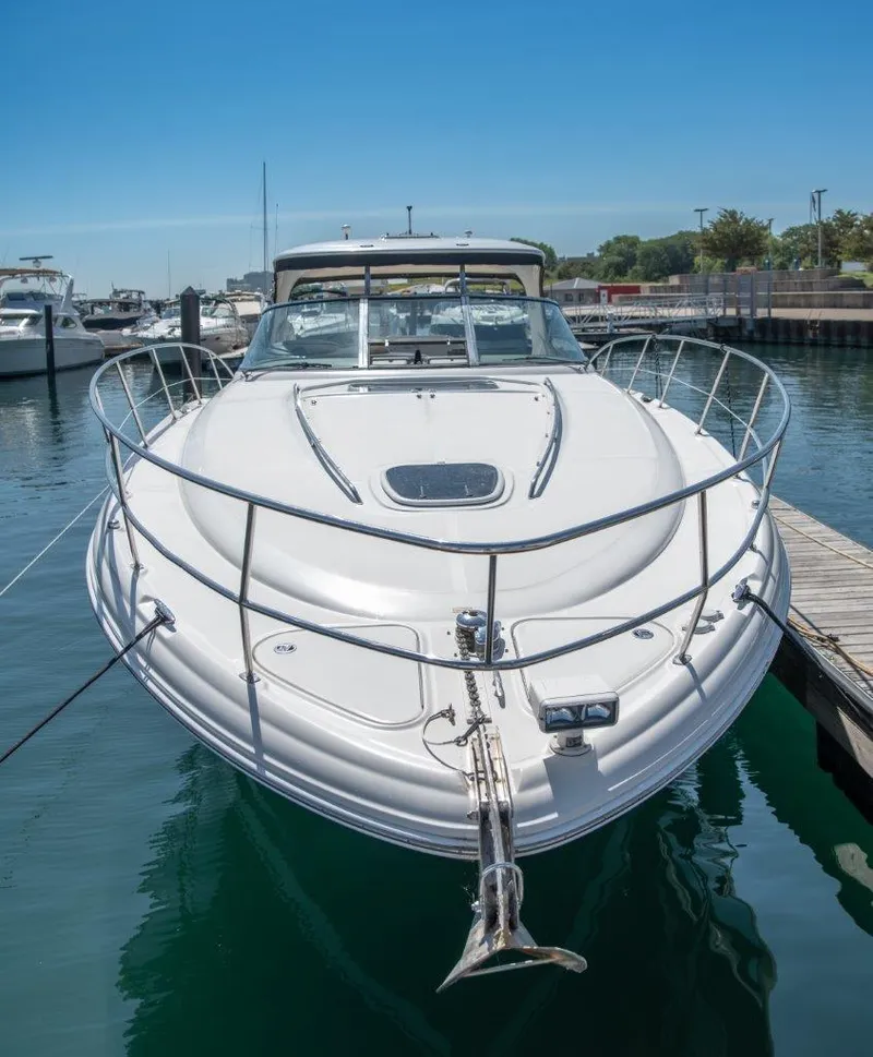 Slide: The Image of 2008 Sea Ray 44 Sundancer yacht docked in marina, front view. - 2
