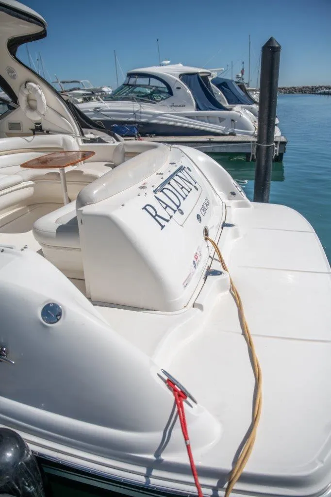 Slide: The Image of 2008 Sea Ray 44 Sundancer docked at marina, sunny day, clear blue sky. - 3