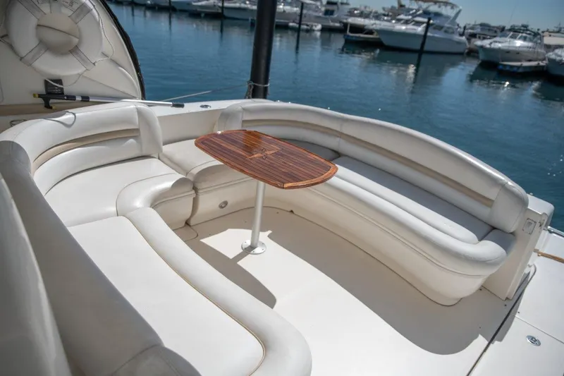 Slide: The Image of Luxurious seating area on 2008 Sea Ray 44 Sundancer yacht, docked at marina. - 4
