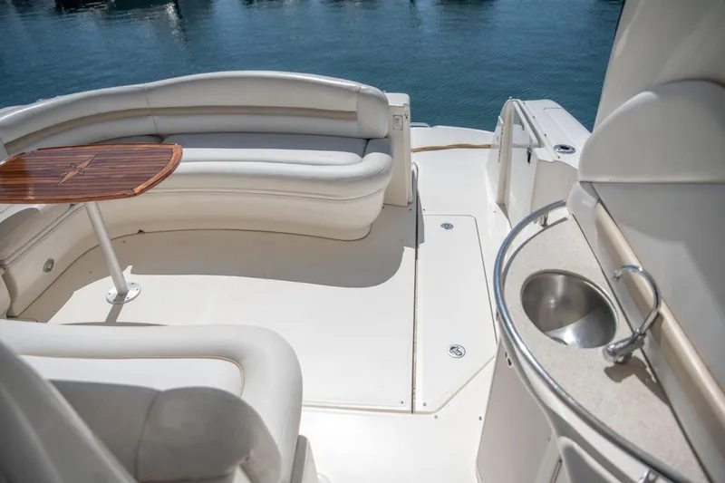 Slide: The Image of 2008 Sea Ray 44 Sundancer yacht interior with seating and sink. - 5
