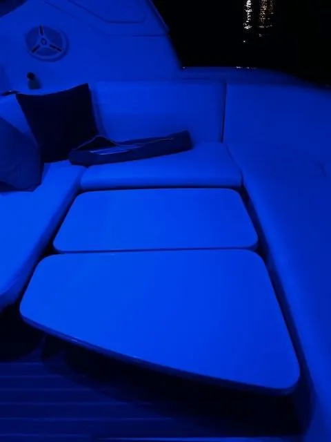 Slide: The Image of 2005 Formula 40 PC boat interior with blue LED lighting at night. - 10