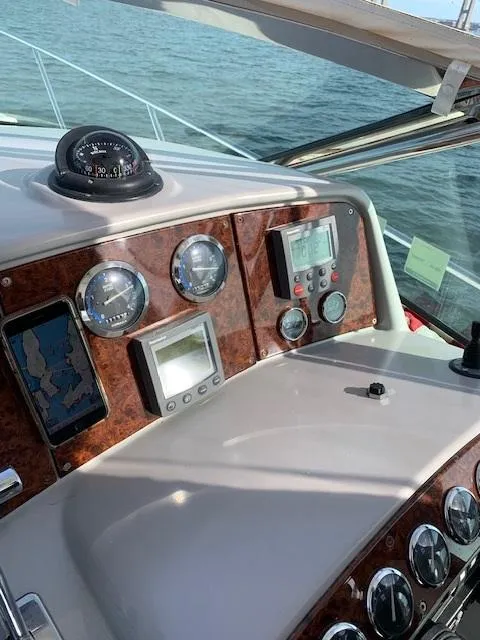 Slide: The Image of Control panel of a 2005 Formula 40 PC boat with navigation instruments. - 5