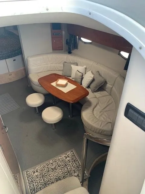 Slide: The Image of 2005 Formula 40 PC yacht interior with cozy seating and wooden table. - 7