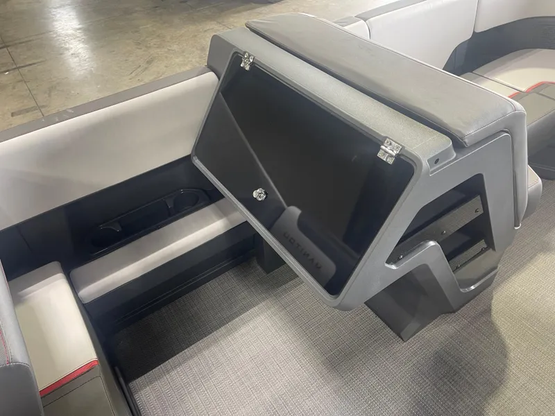 Slide: The Image of 2024 Manitou Cruise boat interior seating with storage compartment. - 10