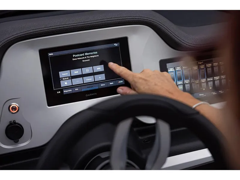Slide: The Image of Touchscreen control panel of 2024 Manitou 25 LX RF boat. - 23