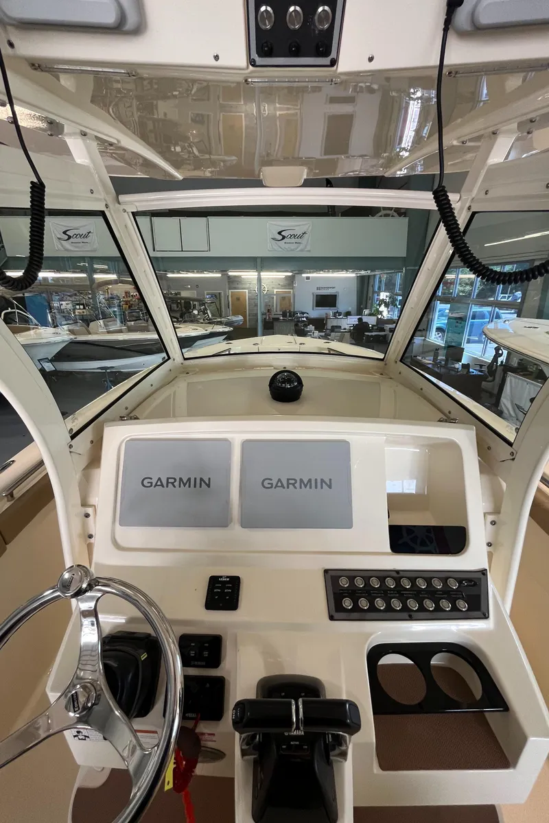 Slide: The Image of 2020 Scout 255 LXF boat dashboard with Garmin navigation system. - 12
