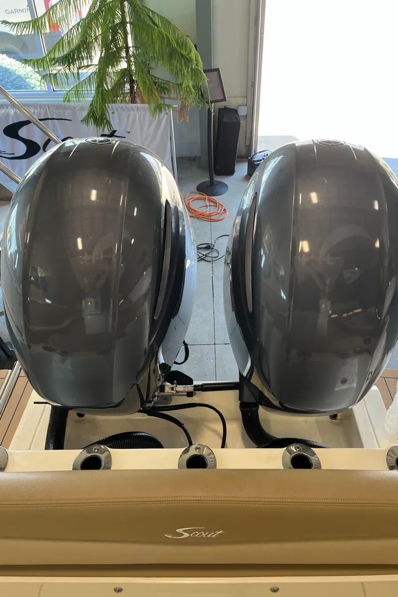 Slide: The Image of 2020 Scout 255 LXF boat with dual outboard engines. - 5