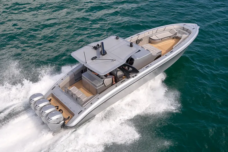 Slide: The Image of 2018 Midnight Express 43 Open boat cruising on the ocean with powerful engines. - 16