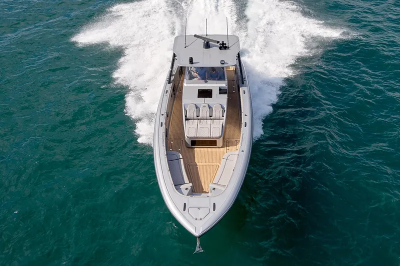Slide: The Image of 2018 Midnight Express 43 Open boat cruising on open water, aerial view. - 19