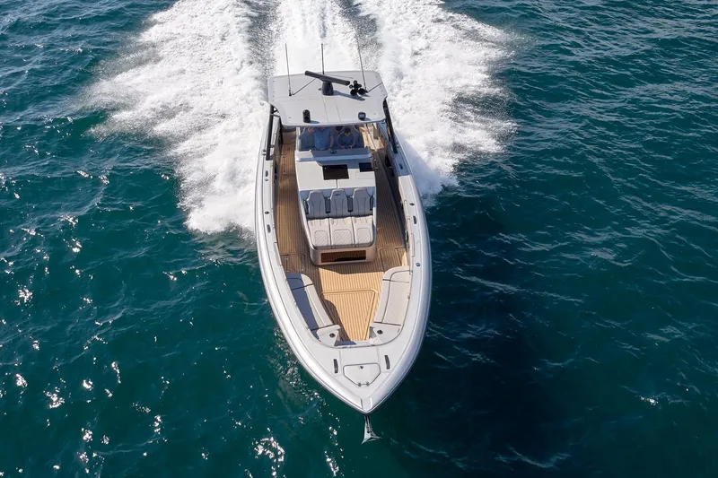 Slide: The Image of 2018 Midnight Express 43 Open yacht cruising on open water, aerial view. - 23