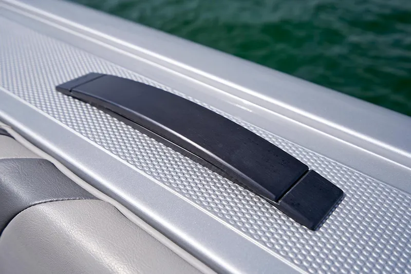Slide: The Image of Handle detail on 2018 Midnight Express 43 Open boat, textured surface, close-up view. - 31