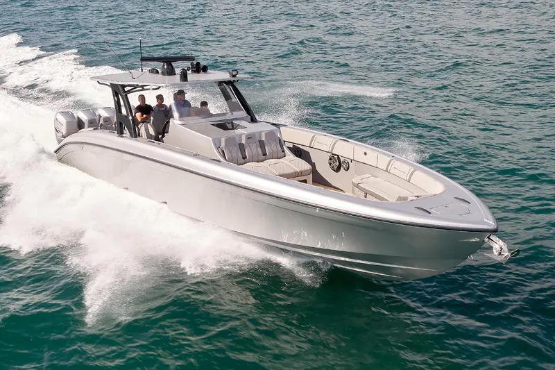 Slide: The Image of 2018 Midnight Express 43 Open boat cruising on ocean waters. - 8