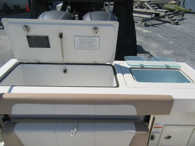 Slide: The Image of 2019 Parker 2810 XLD Walkaround boat with open storage compartments. - 6