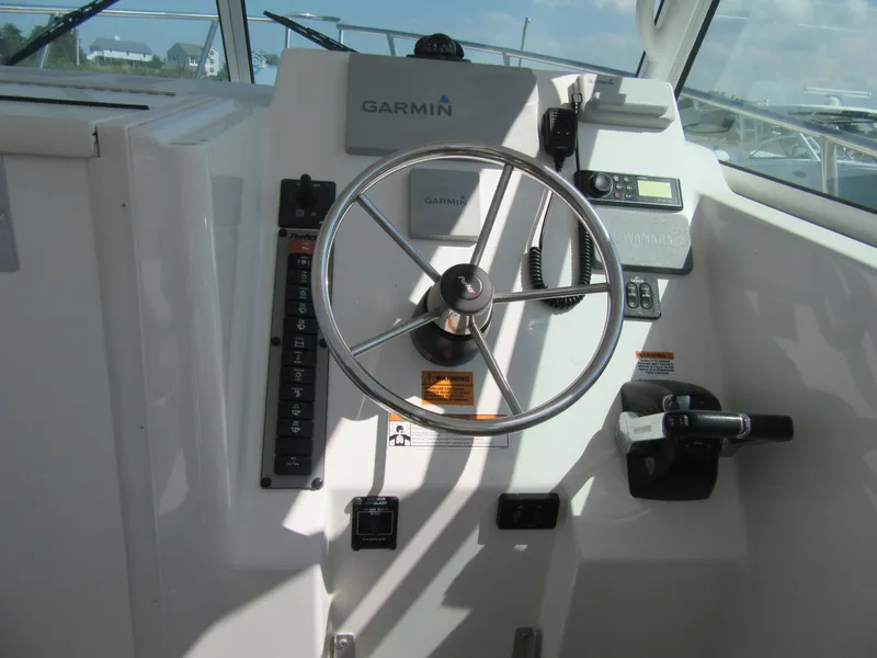 Slide: The Image of 2019 Parker 2810 XLD Walkaround boat helm with Garmin navigation system. - 9