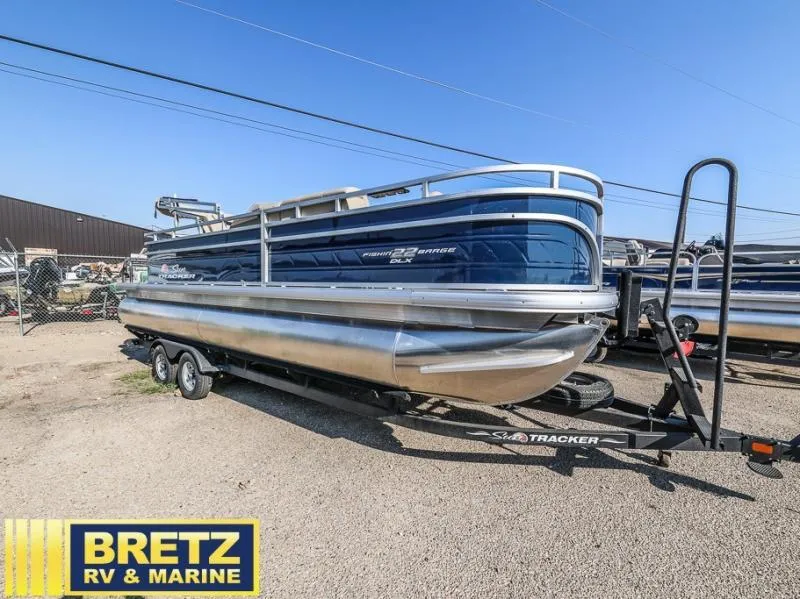 Slide: The Image of 2024 Fishin' Barge 22 DLX pontoon boat on trailer at Bretz RV & Marine. - 3