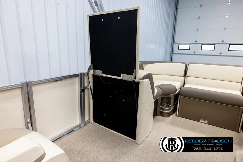 Slide: The Image of 2024 Tahoe LTZ QL boat interior with foldable seat and beige upholstery. - 22