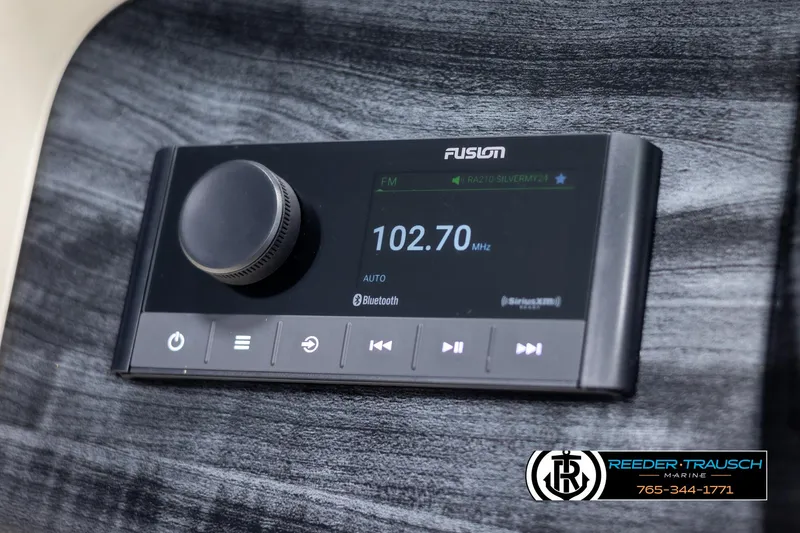 Slide: The Image of 2024 Tahoe LTZ QL Fusion radio display showing 102.70 MHz frequency. - 27