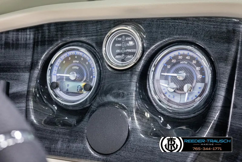Slide: The Image of 2024 Tahoe LTZ QL dashboard with speedometer and tachometer gauges. - 28