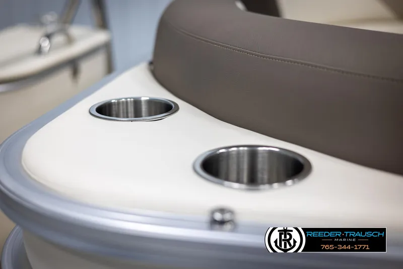 Slide: The Image of 2024 Tahoe LTZ QL boat interior with cup holders and seating. - 33