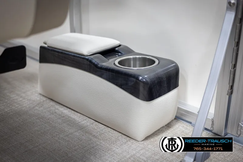 Slide: The Image of 2024 Tahoe LTZ QL boat interior with cup holder and armrest. - 36