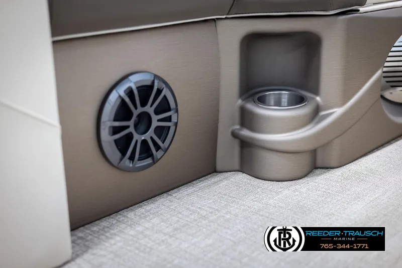 Slide: The Image of 2024 Tahoe LTZ QL interior speaker and cup holder detail. - 37