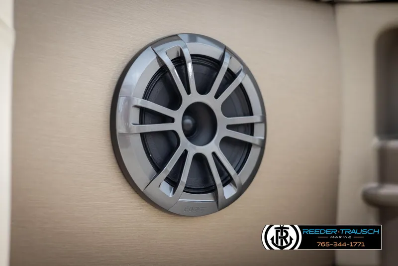 Slide: The Image of 2024 Tahoe LTZ QL boat speaker system, Reeder-Trausch Marine logo. - 38