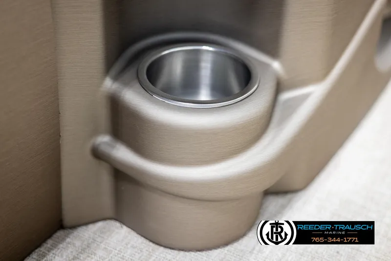 Slide: The Image of 2024 Tahoe LTZ QL cup holder detail in beige interior. - 39