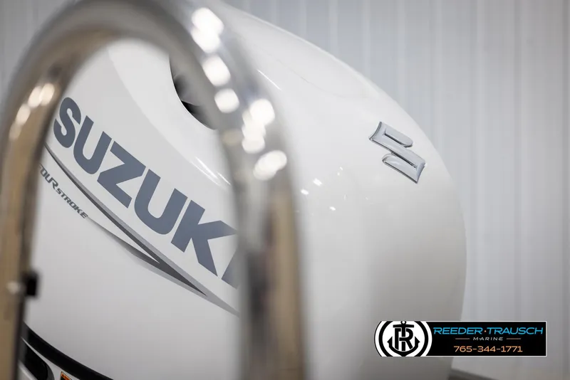 Slide: The Image of 2024 Tahoe LTZ QL with Suzuki outboard motor at Reeder-Trausch Marine. - 42