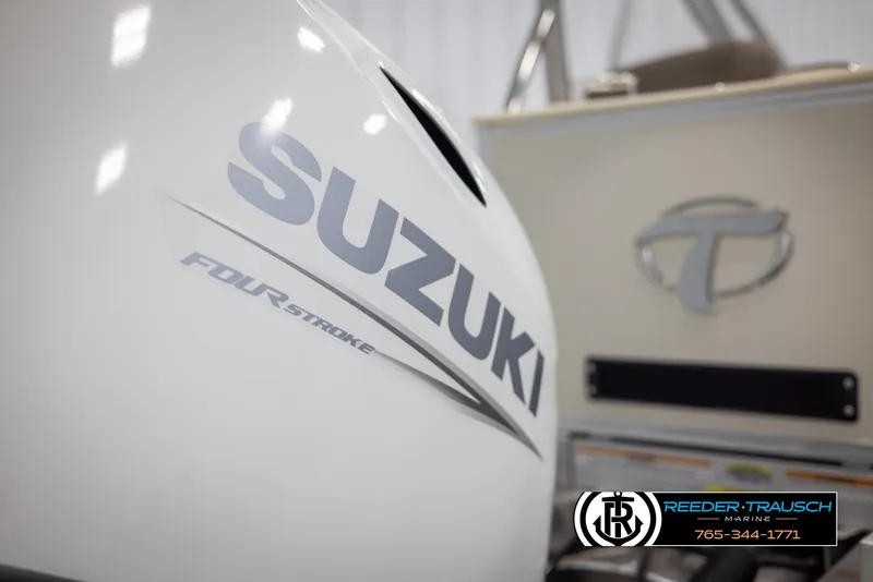 Slide: The Image of Close-up of Suzuki four-stroke engine on 2024 Tahoe LTZ QL boat. - 43
