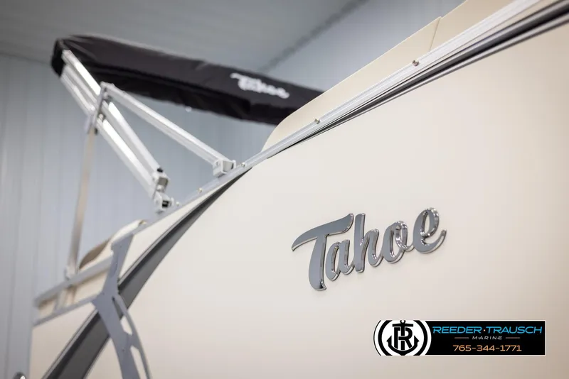 Slide: The Image of 2024 Tahoe LTZ QL boat with Reeder-Trausch Marine logo and contact number. - 47