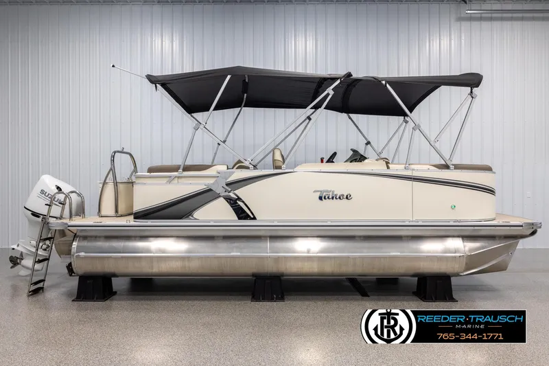 Slide: The Image of 2024 Tahoe LTZ QL pontoon boat with canopy in showroom. - 5