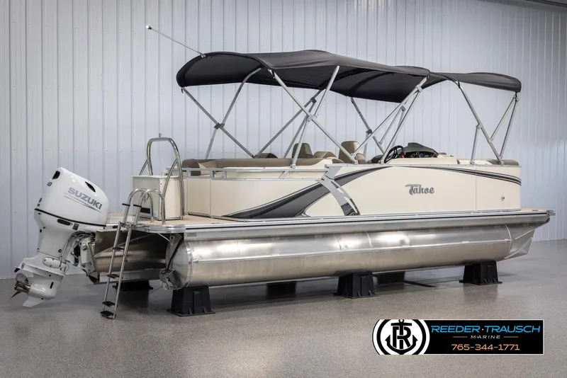 Slide: The Image of 2024 Tahoe LTZ QL pontoon boat with Suzuki outboard motor in showroom. - 6