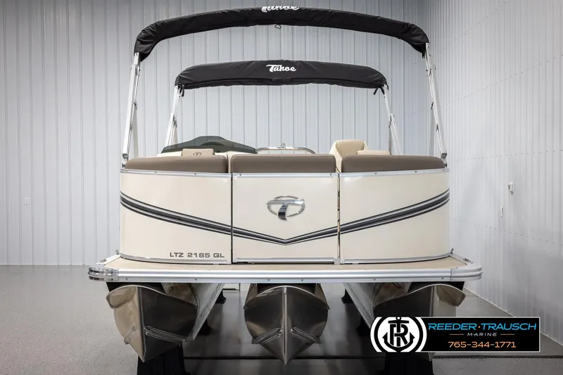 Slide: The Image of 2024 Tahoe LTZ QL pontoon boat with canopy in showroom. - 8