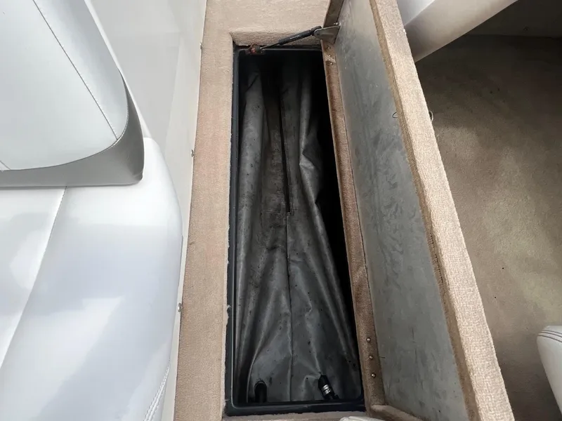 Slide: The Image of Open storage compartment in a 2001 MasterCraft X-10 boat. - 20