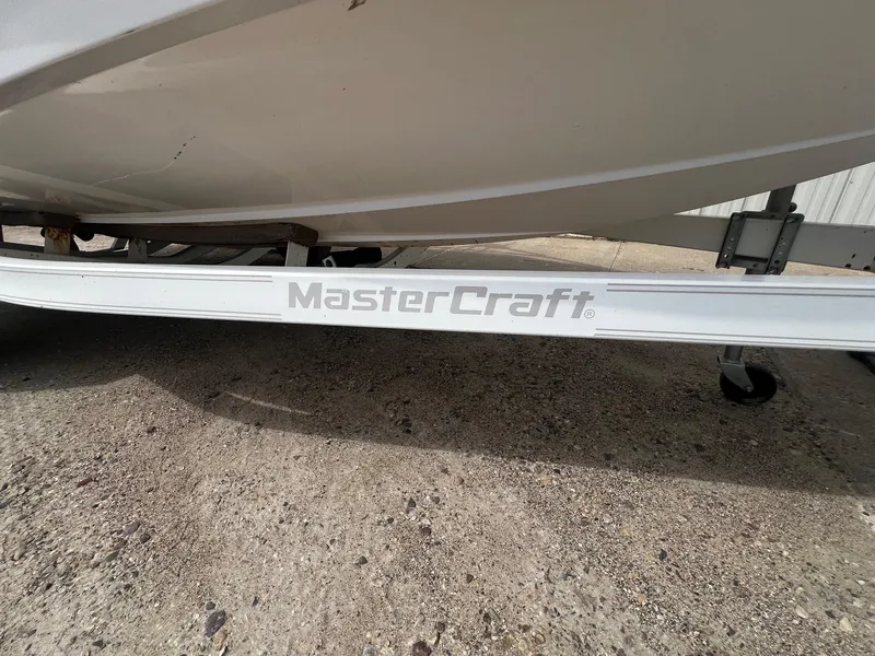 Slide: The Image of 2001 MasterCraft X-10 boat trailer close-up with logo. - 23