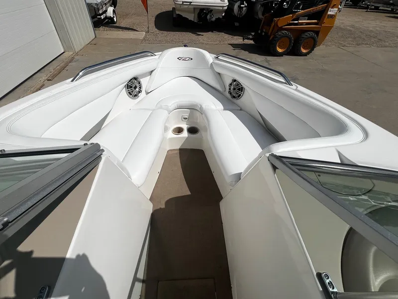 Slide: The Image of 2001 MasterCraft X-10 boat interior with white seating and cup holders. - 5