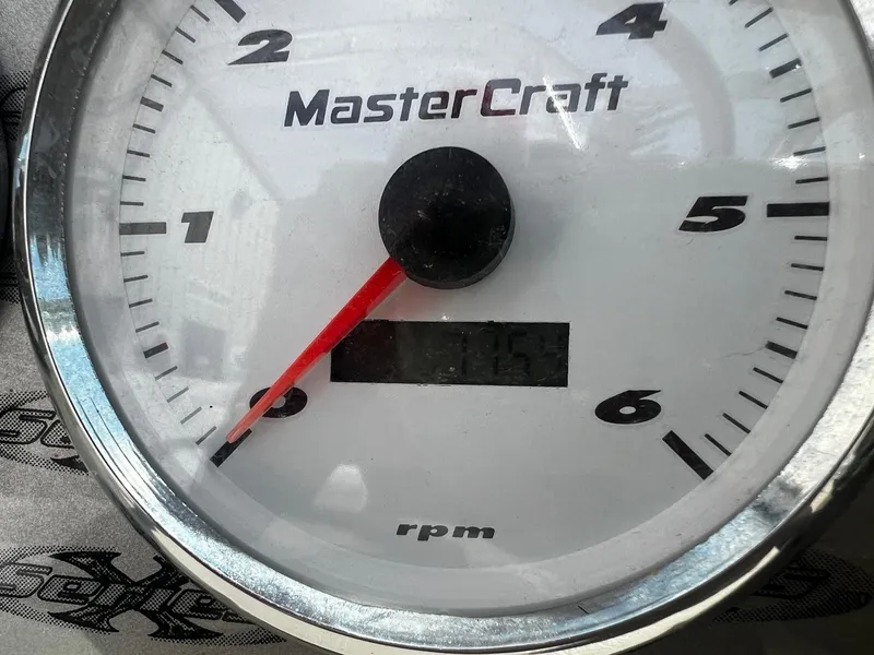 Slide: The Image of Close-up of a 2001 MasterCraft X-10 boat tachometer showing RPM. - 8