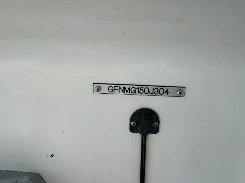 Slide: The Image of 2004 Four Winns 200 Horizon boat identification plate. - 3